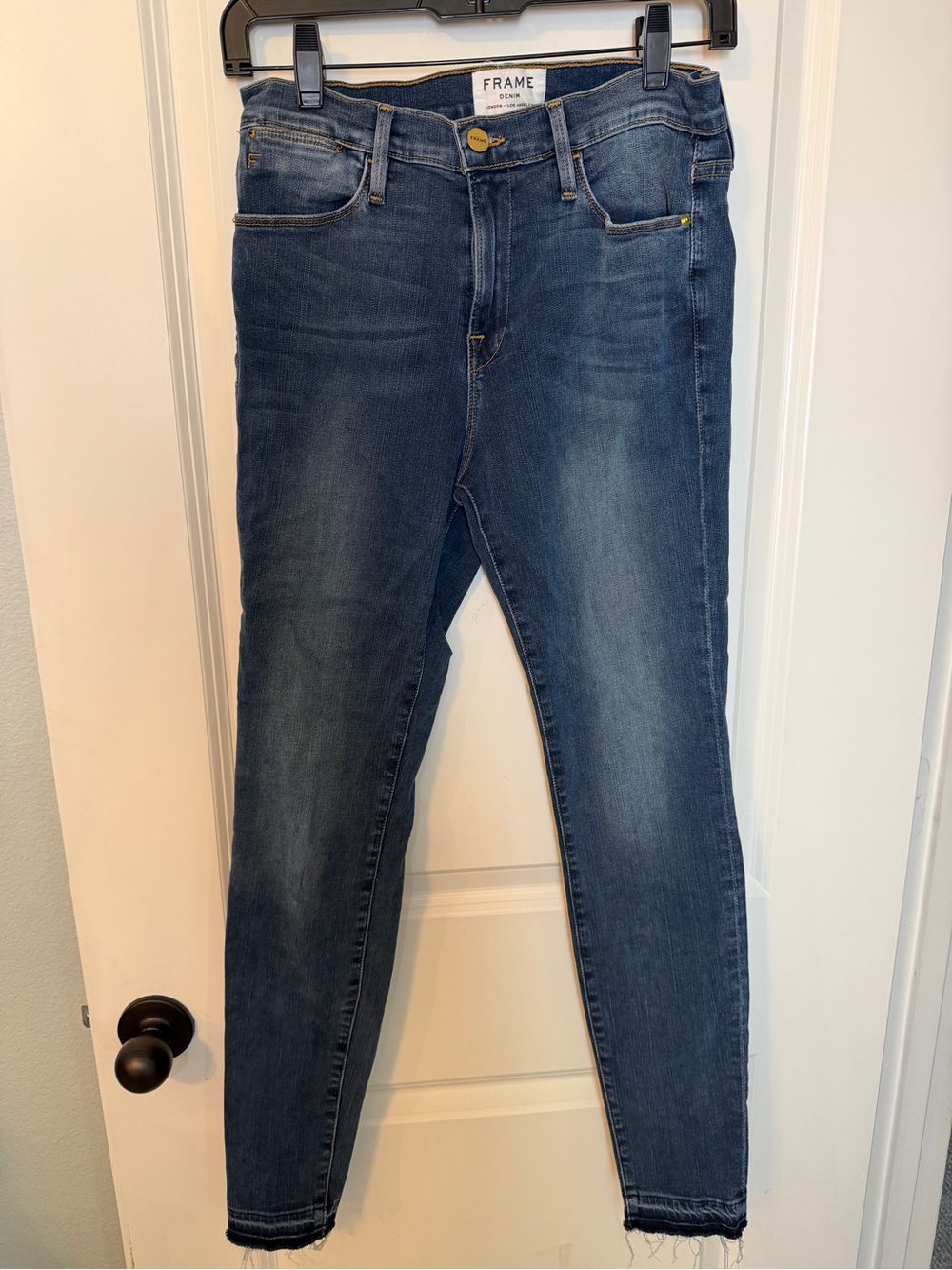 Frame Le High Skinny Frayed Jean